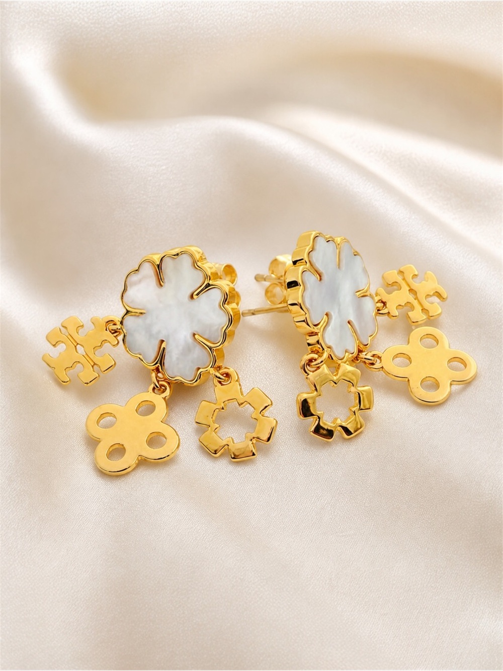 Tory Burch Forget Me Not Cluster Earrings.